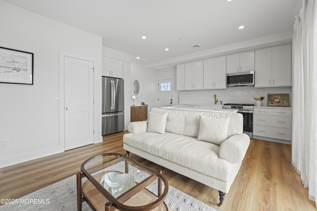 33 Hamilton Ave Unit 7, Seaside Heights, NJ 08751 - living room featuring light wood-style flooring and recessed lighting