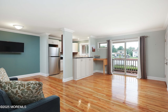 1641 Elm Ave Unit 10, Point Pleasant, NJ 08742 - living room with ornamental molding and light wood-style floors