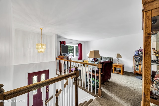 3 Carlo Dr, Keansburg, NJ 07734 - hallway featuring an upstairs landing, a chandelier, and carpet flooring