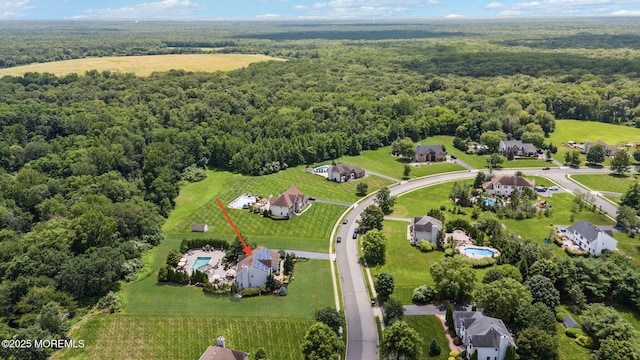 32 Langeveld Dr, Freehold, NJ 07728 - drone / aerial view of a heavily wooded area