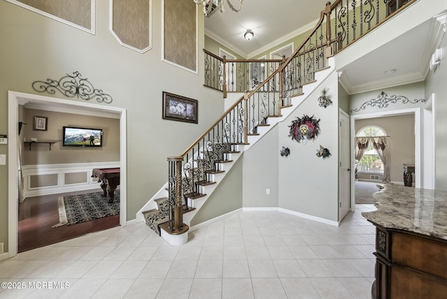 32 Langeveld Dr, Freehold, NJ 07728 - stairs with a high ceiling, crown molding, and tile patterned floors