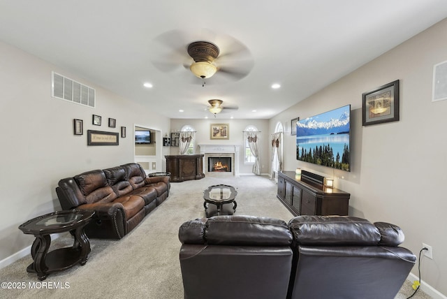 32 Langeveld Dr, Freehold, NJ 07728 - living area with carpet, a ceiling fan, a fireplace with flush hearth, and recessed lighting
