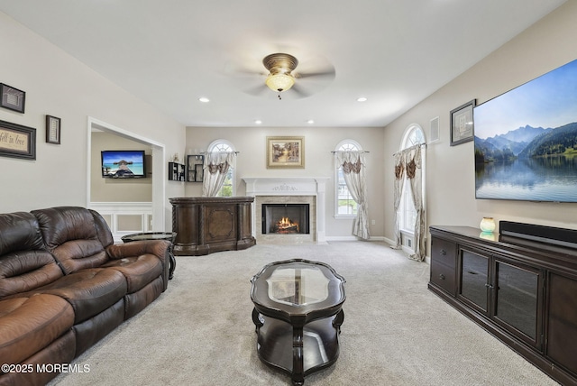 32 Langeveld Dr, Freehold, NJ 07728 - living room with light colored carpet, ceiling fan, healthy amount of natural light, a fireplace, and recessed lighting