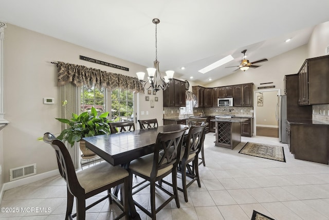 32 Langeveld Dr, Freehold, NJ 07728 - dining space with light tile patterned flooring, lofted ceiling, a chandelier, ceiling fan, and recessed lighting
