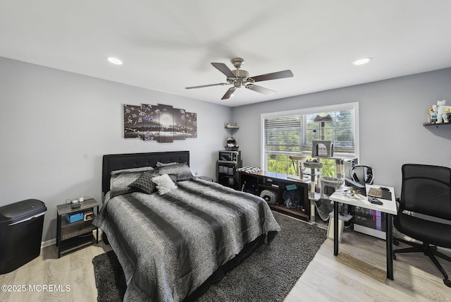 32 Langeveld Dr, Freehold, NJ 07728 - bedroom with wood finished floors, an office area, recessed lighting, and a ceiling fan