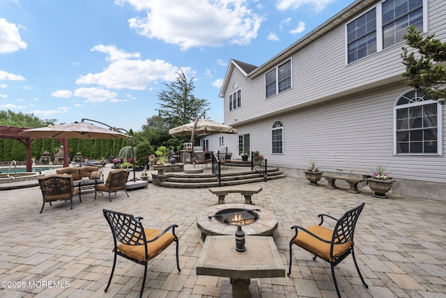 32 Langeveld Dr, Freehold, NJ 07728 - view of patio with an outdoor pool, an outdoor living space with a fire pit, and outdoor dining area