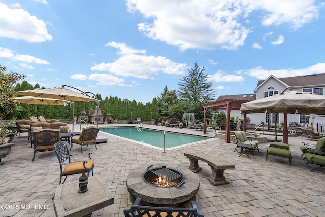 32 Langeveld Dr, Freehold, NJ 07728 - view of swimming pool featuring a pergola, an outdoor living space with a fire pit, and a patio