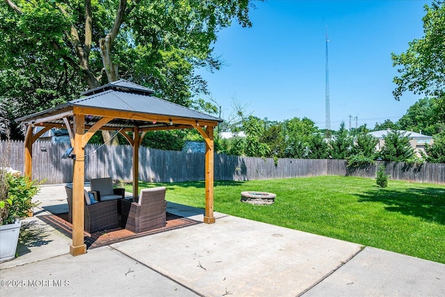 296 High St, Metuchen, NJ 08840 - fenced backyard with a patio, a gazebo, and an outdoor living space with a fire pit
