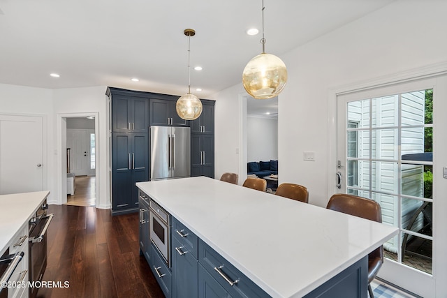 12 Linda Ln, Tinton Falls, NJ 07724 - kitchen with high end fridge, built in microwave, light countertops, dark wood-type flooring, and recessed lighting