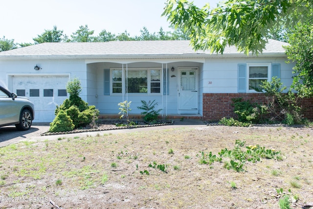 30 Sherwood Ln, Toms River, NJ 08757 - single story home featuring a garage, brick siding, and a shingled roof