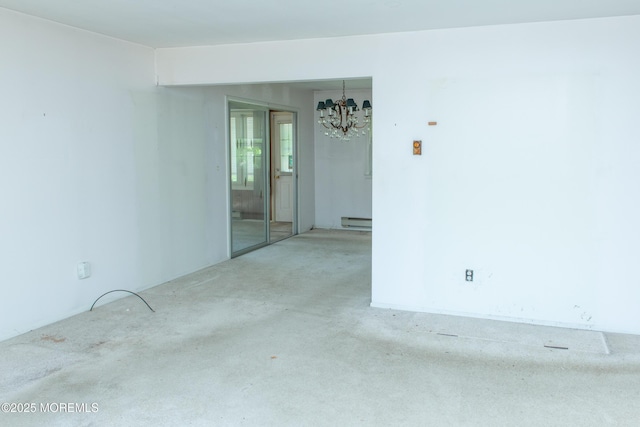 30 Sherwood Ln, Toms River, NJ 08757 - carpeted spare room featuring a chandelier and a baseboard heating unit