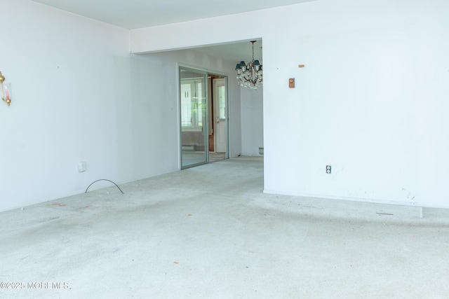 30 Sherwood Ln, Toms River, NJ 08757 - carpeted spare room featuring a chandelier and a baseboard radiator