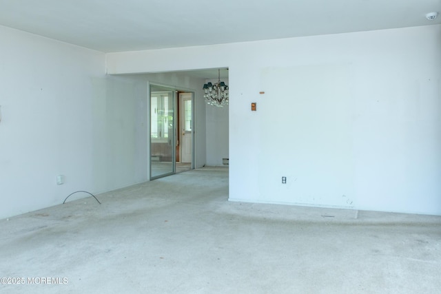 30 Sherwood Ln, Toms River, NJ 08757 - carpeted empty room featuring a chandelier and a baseboard radiator