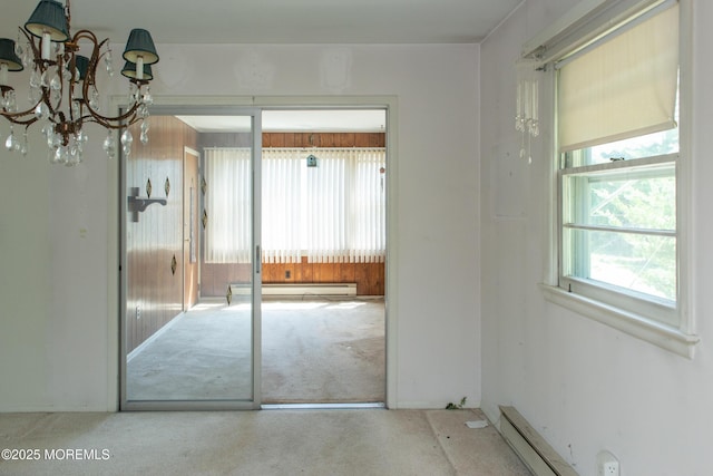 30 Sherwood Ln, Toms River, NJ 08757 - unfurnished dining area featuring a baseboard radiator, carpet flooring, and a chandelier
