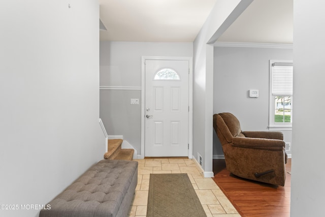 3 Thompson Ln, Manalapan, NJ 07726 - foyer with healthy amount of natural light, stairs, and ornamental molding