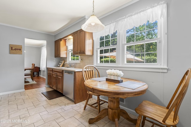 3 Thompson Ln, Manalapan, NJ 07726 - kitchen with dishwasher, ornamental molding, light countertops, tasteful backsplash, and brown cabinets