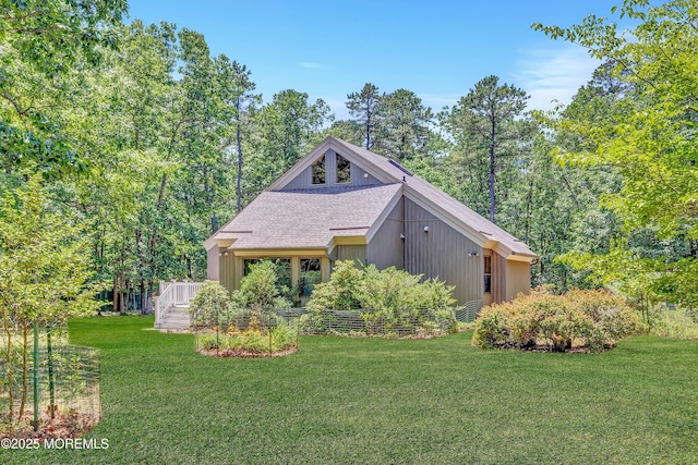 538 Perrineville Rd, Jackson, NJ 08527 - view of front of house featuring a front yard, a wooden deck, and a shingled roof