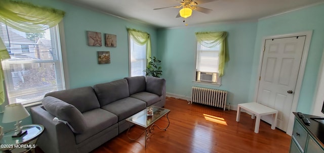412 Park Place Ave, Bradley Beach, NJ 07720 - living area with radiator heating unit, a ceiling fan, wood finished floors, cooling unit, and ornamental molding