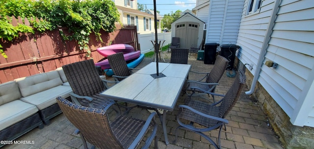 412 Park Place Ave, Bradley Beach, NJ 07720 - view of patio with outdoor dining space, a storage unit, and an outdoor living space