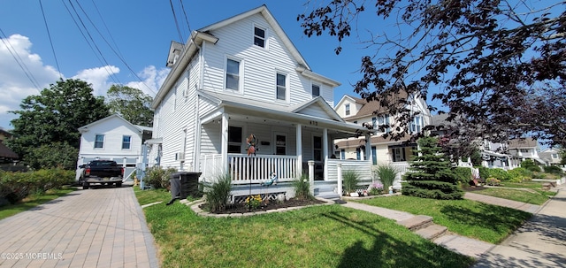 412 Park Place Ave, Bradley Beach, NJ 07720 - view of front of house with covered porch and a front yard