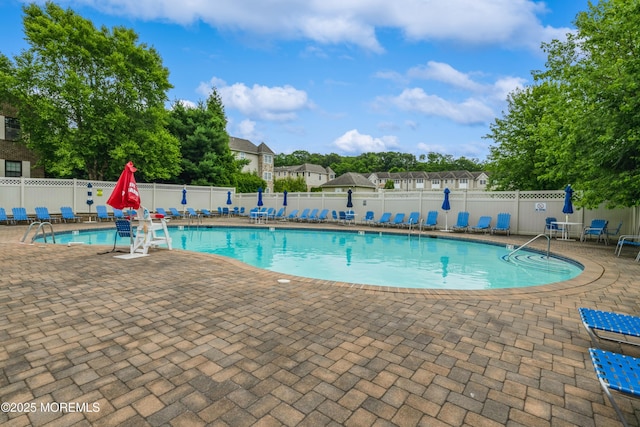 1111 Wellington Pl, Matawan, NJ 07747 - community pool with a patio area
