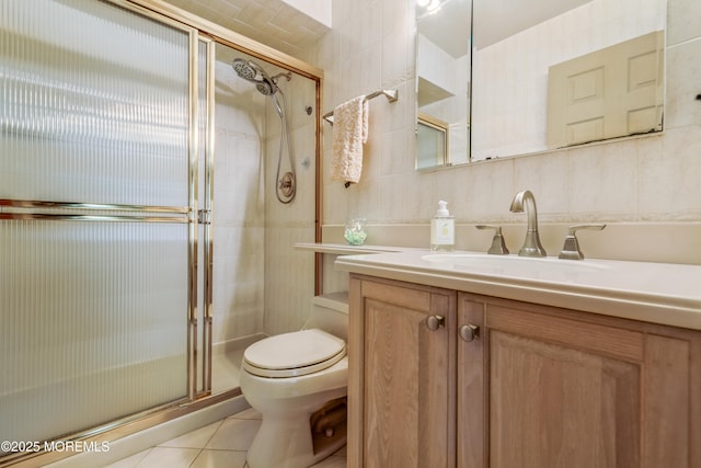 1111 Wellington Pl, Matawan, NJ 07747 - bathroom with a shower stall, vanity, tile patterned flooring, and tile walls