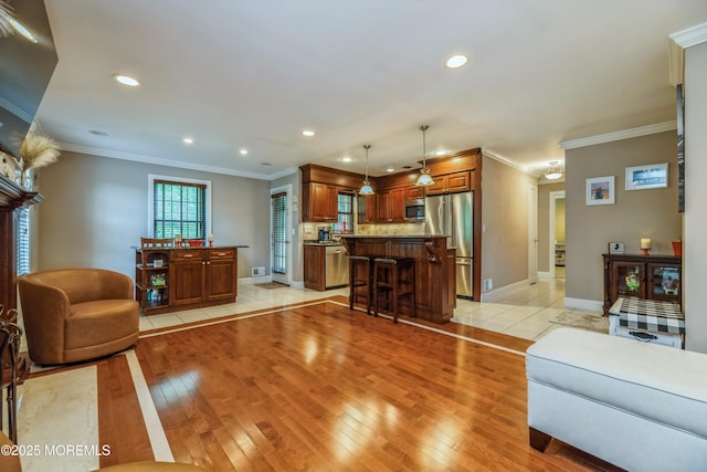 1111 Wellington Pl, Matawan, NJ 07747 - living room featuring light wood-style flooring, crown molding, and recessed lighting