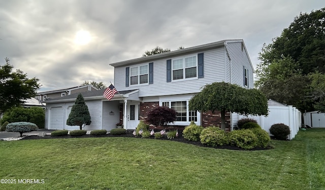 70 Appletree Rd, Howell, NJ 07731 - view of front of home with a garage and brick siding