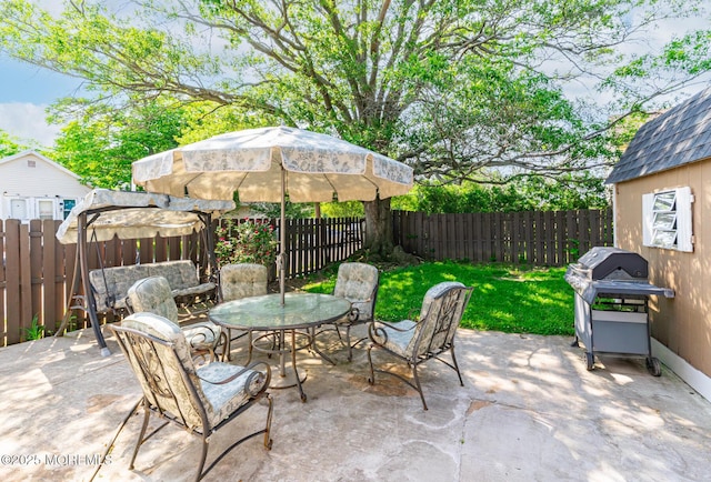 137 Seabreeze Way, Keansburg, NJ 07734 - fenced backyard featuring grilling area, outdoor dining space, and a patio area