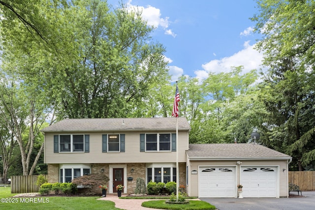 280 Double Creek Pkwy, Freehold, NJ 07728 - view of front facade featuring a garage, driveway, and brick siding