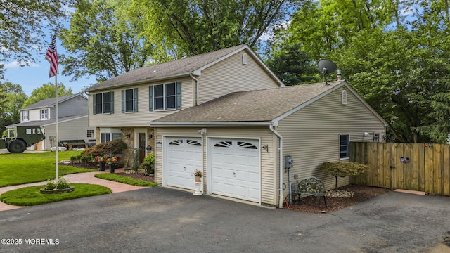 280 Double Creek Pkwy, Freehold, NJ 07728 - view of front of house featuring an attached garage, roof with shingles, driveway, and a gate