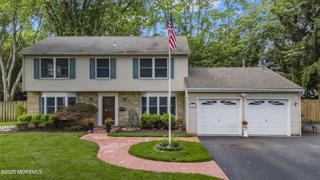 280 Double Creek Pkwy, Freehold, NJ 07728 - view of front facade featuring a garage, driveway, brick siding, and roof with shingles