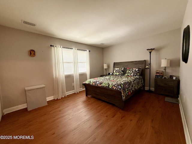 4 Nebraska Dr Unit C, Matawan, NJ 07747 - bedroom featuring dark wood-type flooring and baseboards
