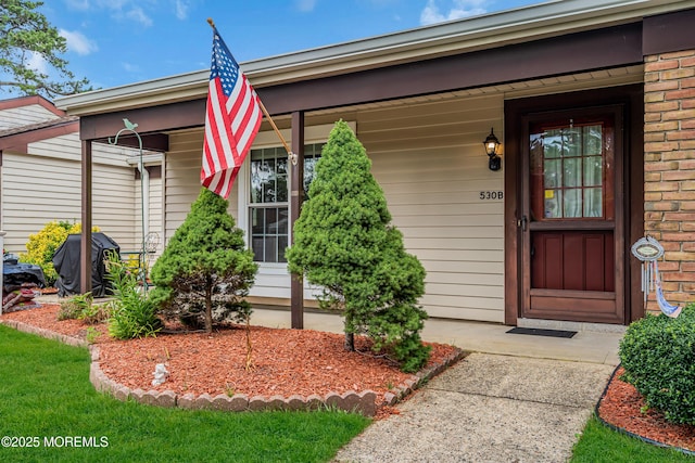 530B Sheffield Dr, Manchester, NJ 08759 - entrance to property with a porch and brick siding
