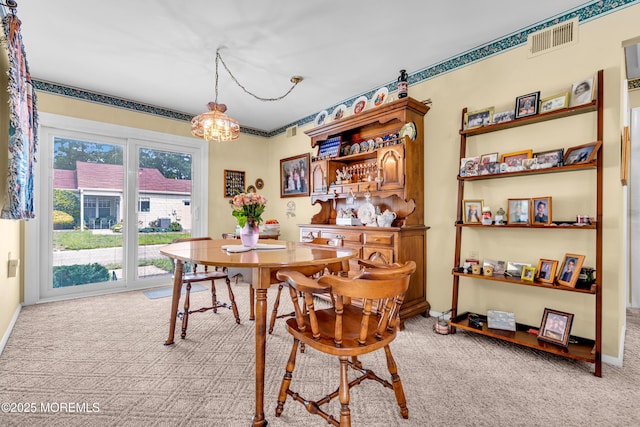 530B Sheffield Dr, Manchester, NJ 08759 - dining room with light carpet and a chandelier