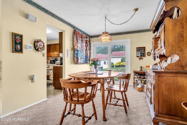 530B Sheffield Dr, Manchester, NJ 08759 - dining area featuring a chandelier, crown molding, and light carpet