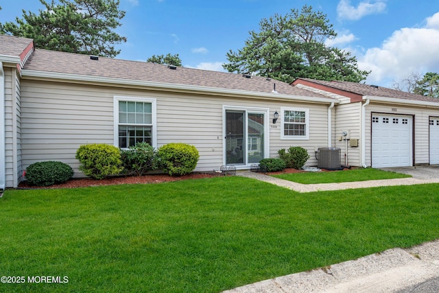 530B Sheffield Dr, Manchester, NJ 08759 - ranch-style home with a front yard, a garage, and roof with shingles