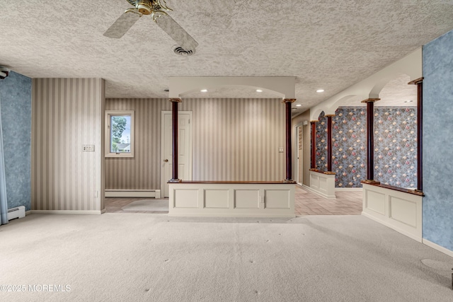 811 Fay Ct, Point Pleasant, NJ 08742 - unfurnished living room with light carpet, wallpapered walls, a baseboard heating unit, a ceiling fan, and recessed lighting