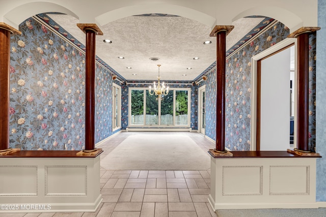 811 Fay Ct, Point Pleasant, NJ 08742 - hallway featuring wallpapered walls, a baseboard heating unit, a chandelier, a textured ceiling, and recessed lighting