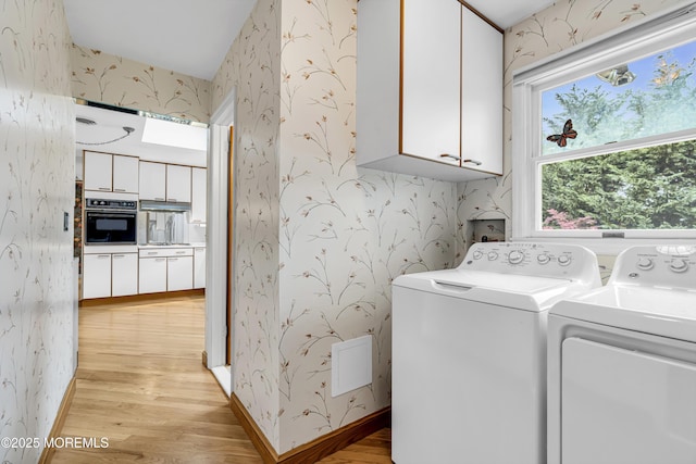 811 Fay Ct, Point Pleasant, NJ 08742 - laundry room featuring cabinet space, wallpapered walls, washer and dryer, and light wood-type flooring