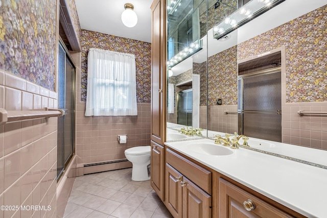 811 Fay Ct, Point Pleasant, NJ 08742 - full bath with wallpapered walls, a baseboard radiator, tile walls, tile patterned floors, and vanity