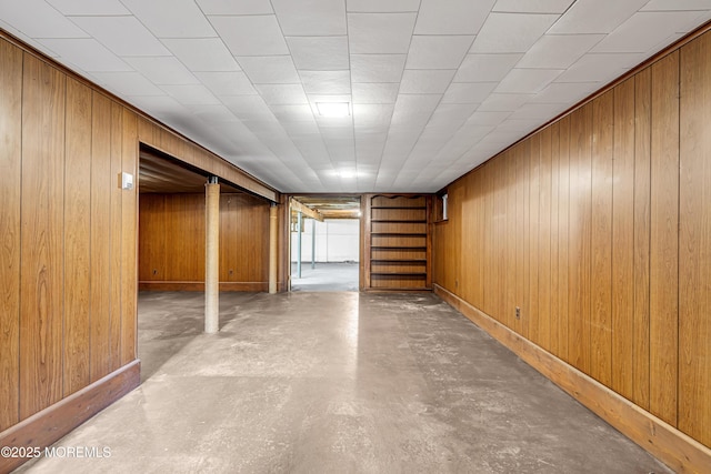 811 Fay Ct, Point Pleasant, NJ 08742 - spare room featuring unfinished concrete floors, wood walls, and stairway