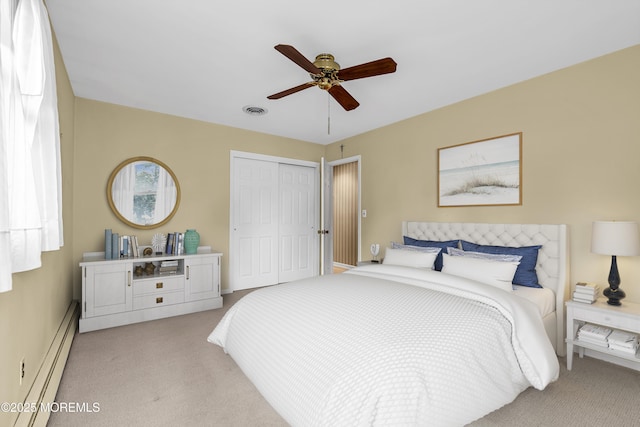 811 Fay Ct, Point Pleasant, NJ 08742 - bedroom with a baseboard radiator, carpet, a closet, and ceiling fan