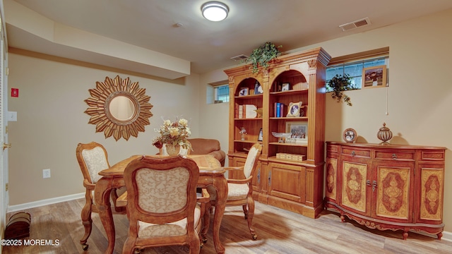56 W Aspen Way, Aberdeen, NJ 07747 - dining space with light wood-style flooring and baseboards