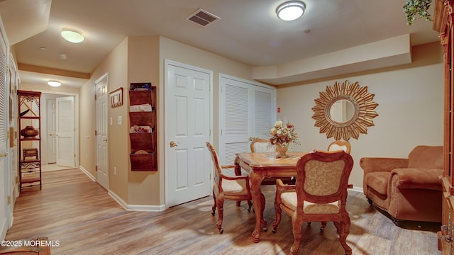 56 W Aspen Way, Aberdeen, NJ 07747 - dining space with light wood finished floors and baseboards