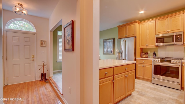 56 W Aspen Way, Aberdeen, NJ 07747 - kitchen with appliances with stainless steel finishes and light countertops