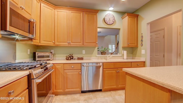 56 W Aspen Way, Aberdeen, NJ 07747 - kitchen featuring stainless steel appliances, light countertops, and recessed lighting