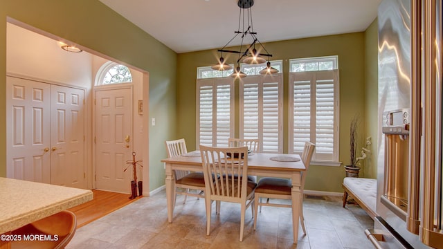 56 W Aspen Way, Aberdeen, NJ 07747 - dining space with light tile patterned flooring