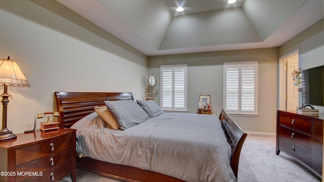 56 W Aspen Way, Aberdeen, NJ 07747 - carpeted bedroom with multiple windows, recessed lighting, vaulted ceiling, and a tray ceiling