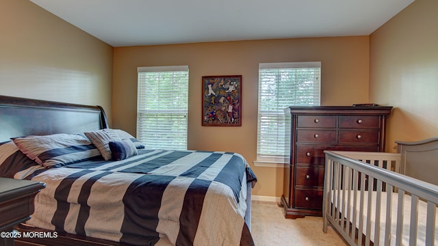 56 W Aspen Way, Aberdeen, NJ 07747 - bedroom with light colored carpet and multiple windows